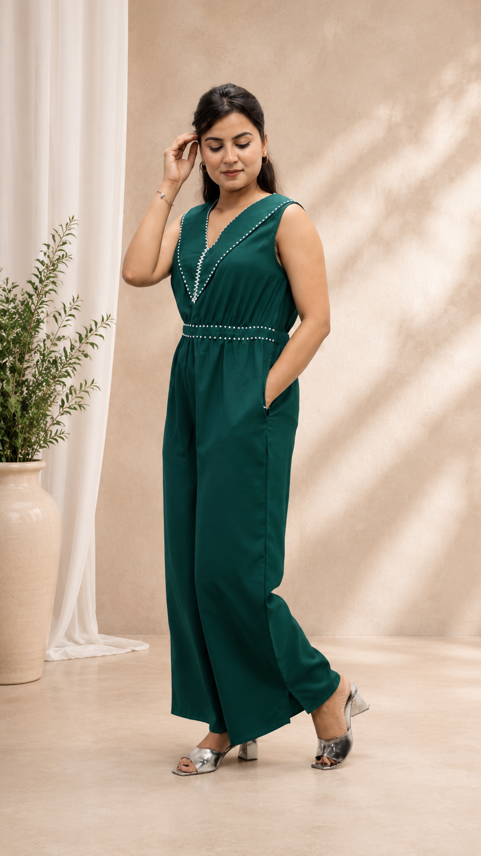BOTTLE GREEN POLY CRAPE HAND WORK FLARED JUMP SUIT