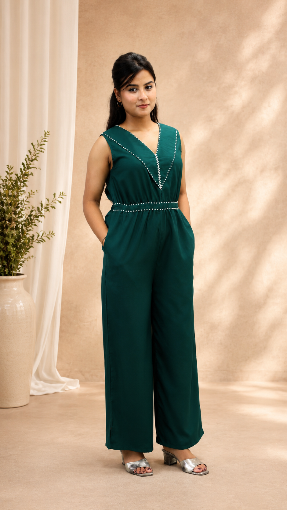 BOTTLE GREEN POLY CRAPE HAND WORK FLARED JUMP SUIT