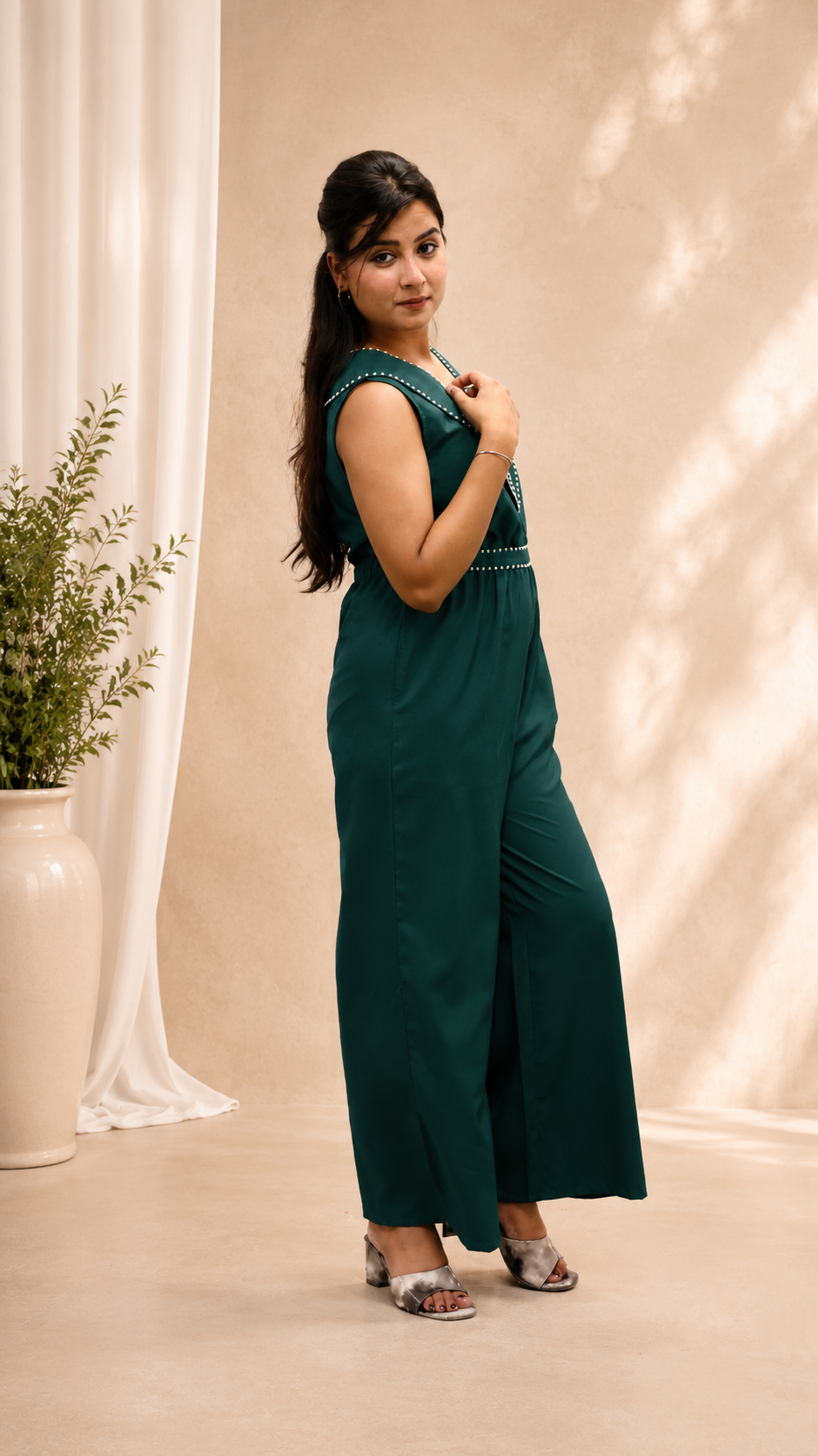 BOTTLE GREEN POLY CRAPE HAND WORK FLARED JUMP SUIT