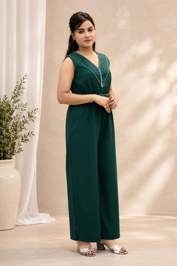 BOTTLE GREEN POLY CRAPE HAND WORK FLARED JUMP SUIT